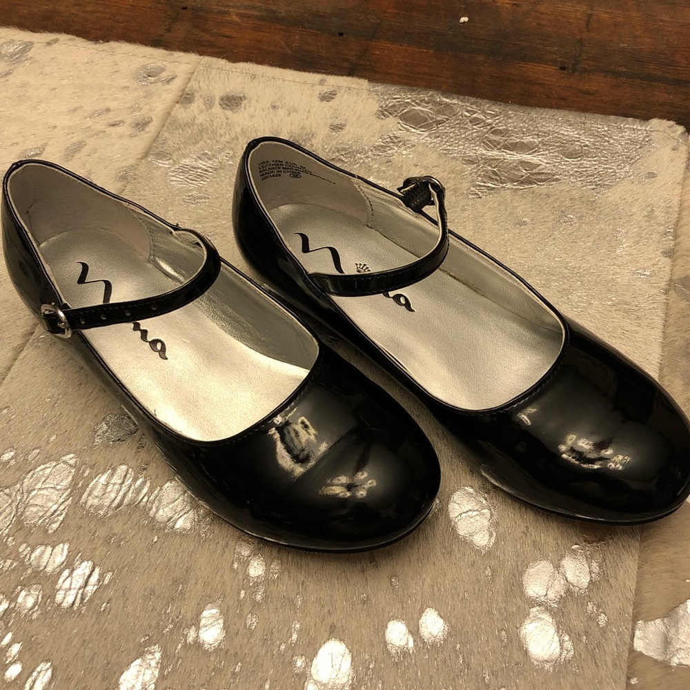 Black patent Nina dress shoes.